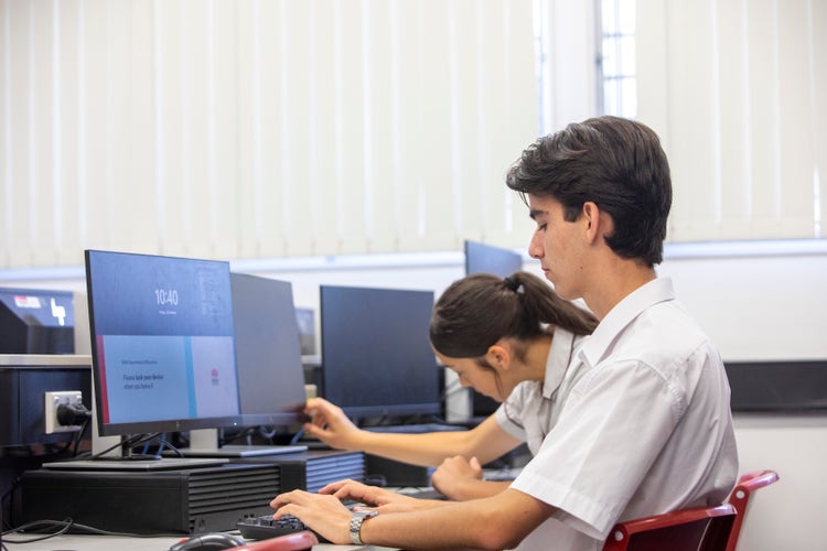 A student logging in to a school computer.